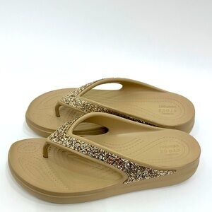 Crocs Women’s Sloane glitter wedge gold  tan flip-flops size 10.